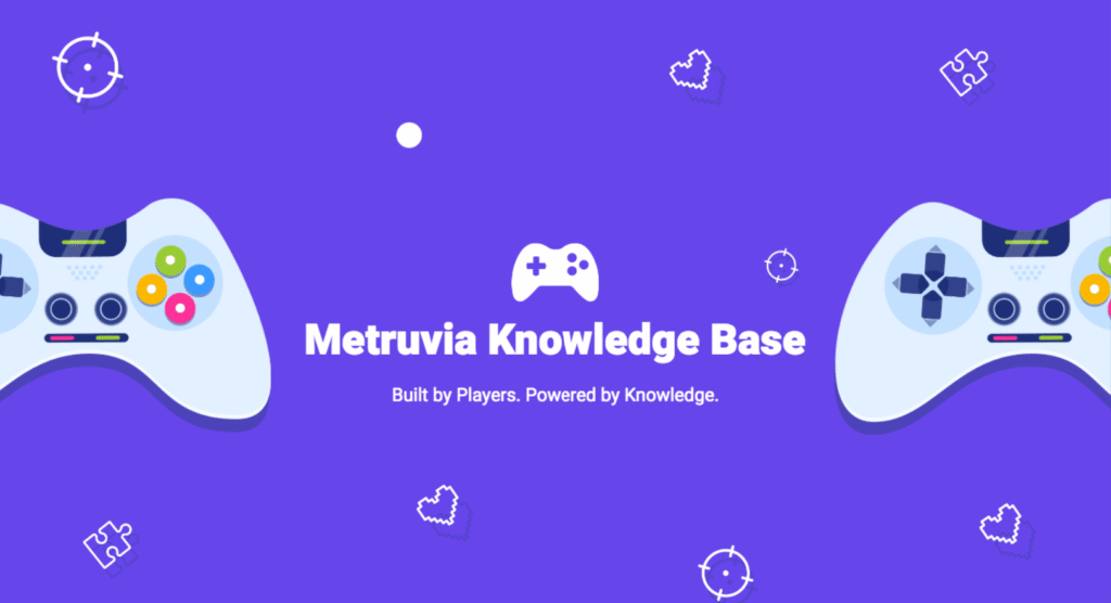 It is a clean, minimal, purple-themed graphic social media banner, serving as the official header for the "Metruvia Knowledge Base" (Metruvia and Metruvia Knowledge Base) Transport Fever mod brand on Mod.io. The banner is set against a solid, deep-violet-purple background with a rich saturation. In the upper-center, a white, simplified, and symmetrical game controller icon is positioned. Directly below this icon, in prominent, white, bold, sans-serif text, is the text "Metruvia Knowledge Base". Below that, in smaller, regular white text, is the tagline "Built by Players. Powered by Knowledge." Symmetrically framing the central text and icon, on the far left and far right sides, are two large, detailed, white game controllers, depicted from a top-down aerial perspective with colorful button inputs (yellow, blue, pink, and green) and analog sticks. Scattered across the remaining purple space are small, white line-art icons that reinforce the gaming and puzzle themes: several puzzle piece outlines, small pixel-art heart outlines, simple bullseye targets, and a single solid white circle (a "knowledge" point). The layout is balanced, professional, and easily recognizable as part of a gaming community and documentation resource. The art style is flat vector graphic. A small, stylized white compass needle icon, derived from the Metruvia brand mark, is visible over the left analog stick of the controller on the right, providing a cohesive brand identity. The text is sharp and legible.